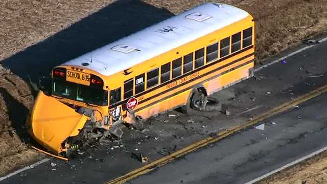 SUV driver dies in crash with school bus