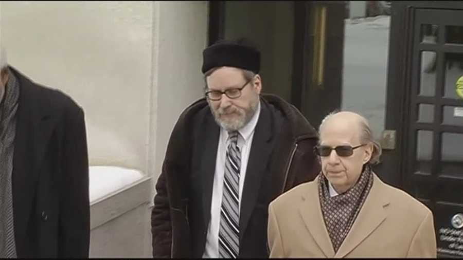 A rabbi and suspended Towson University professor accused of secretly videotaping scores of women at a Jewish ritual bath at Washington, D.C., synagogue pleads guilty Thursday to dozens of counts against him.