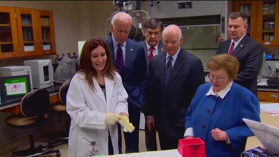The vice president, flanked by high-ranking Maryland officials, tour the Maryland State Police Forensic Science Lab and announce the new Sexual Assault Kit Initiative.