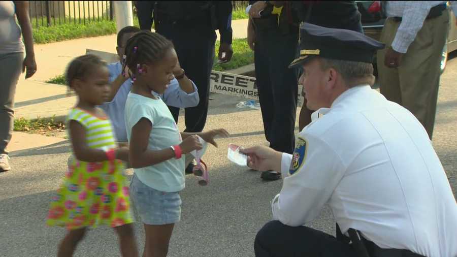 As violence continues to be a problem in Baltimore, city police and other leaders joined residents to celebrate National Night Out as a way to bring the community together.