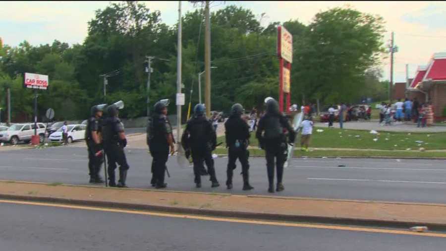 Police were pelted with rocks and other objects Sunday as they responded to deal with a large gathering of illegal dirt bike riders along Reisterstown Road in northwest Baltimore.