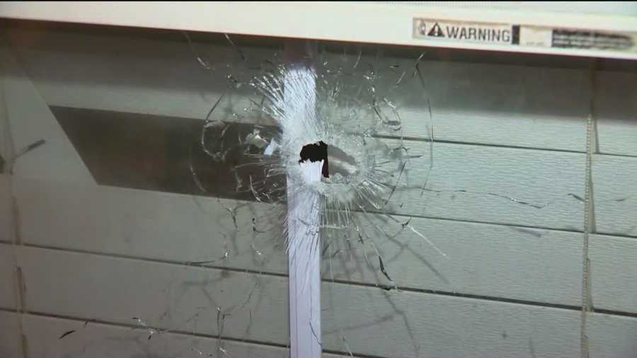 A masked gunman is suspected of opening fire Saturday night in a Severn neighborhood that left an 18-year-old man shot and multiple homes and vehicles with bullet holes.