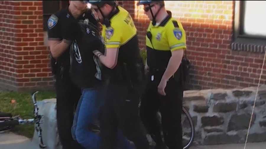 The jury watched cell phone video showing the arrest of Freddie Gray and saw the van used to transport him during the fourth day in the trial of Officer William Porter. Porter is the first of six officers to go on trial on charges connected to Gray's death.