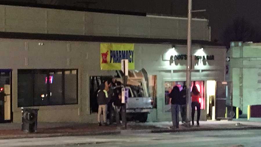 A pickup truck lost control and crashed into a northeast Baltimore strip mall Wednesday night.