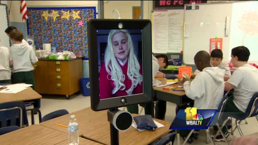 A robot is helping chronically ill students keep up with school by attending class when they can't. A Maryland sixth-grade student said it's easing the burden of her illness. The sixth-grade students at Monsignor Slade Catholic School are bringing ancient Egypt to life inside their classroom. Teacher Laura Briggs expects every student to participate. Emily Kolenda is keeping up with her class through a robot, a device that consists of an iPad on wheels that she controls from home.