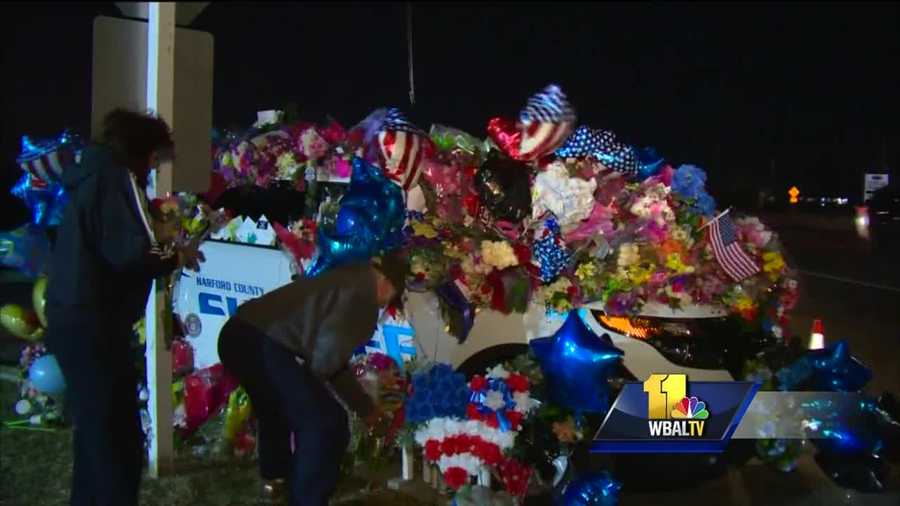 Residents, law enforcement members and others braved the freezing cold to attend a candlelight vigil in memory of two Harford County Sheriff's Office deputies who were fatally shot Wednesday in Abingdon. Senior Deputy Patrick Dailey and Senior Deputy Mark Logsdon were the first from their office to be shot and killed in the line of duty since 1899.