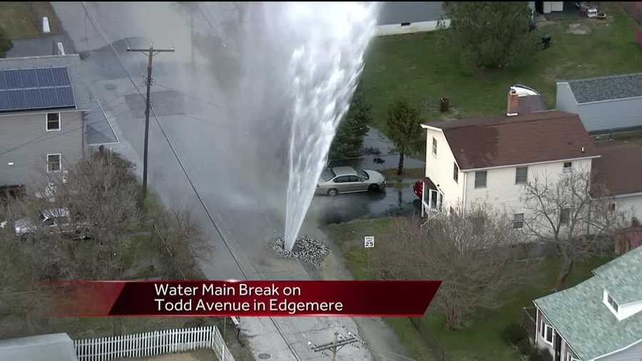 A water main break on Todd Avenue near Fort Avenue in Edgemere, Baltimore County, is gushing water straight up into the air.