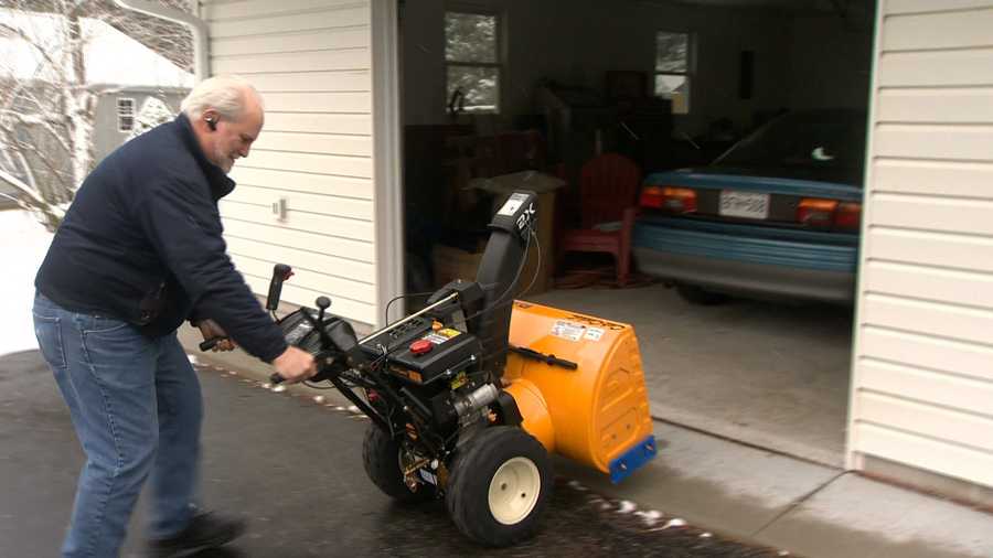 John Zacharais, of Westminster, is hoping he put his newly-bought snowblower away for the last time this season after a light snow blanketed the area Friday.