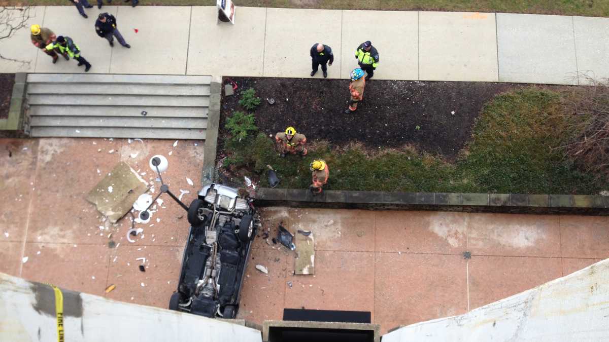 Police Car falls from Towson garage