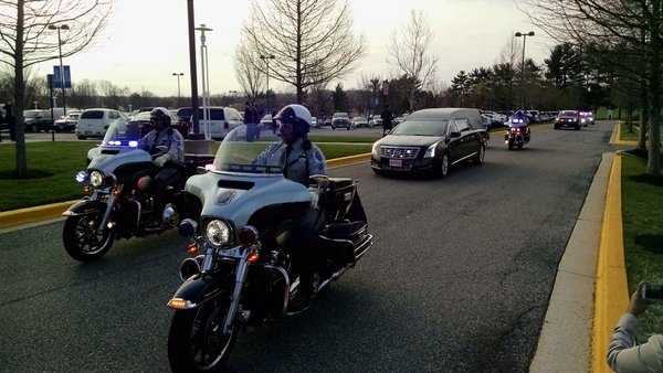 The body of Prince George's County police Officer Jacai Colson arrives for his funeral