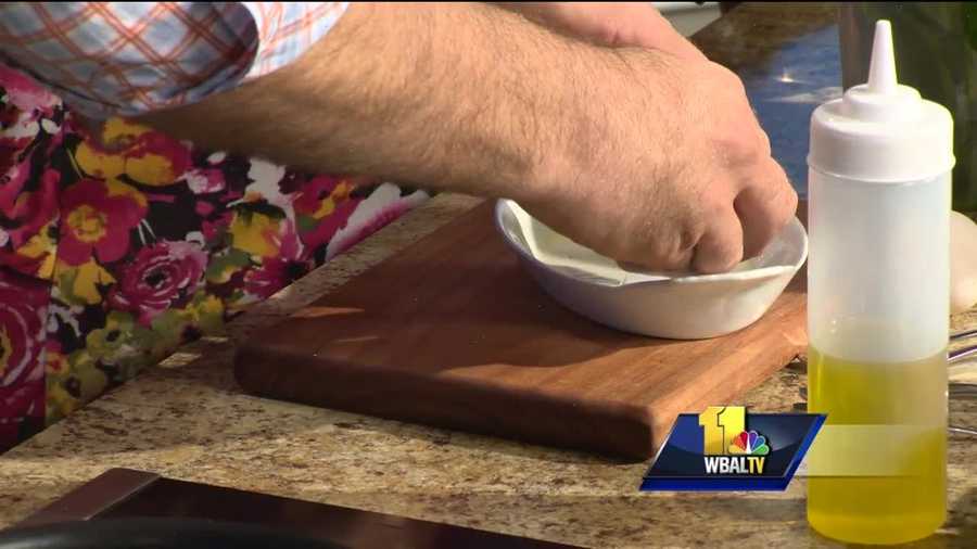 Kevin Miller with Copper Kitchen serves up baked duck eggs.