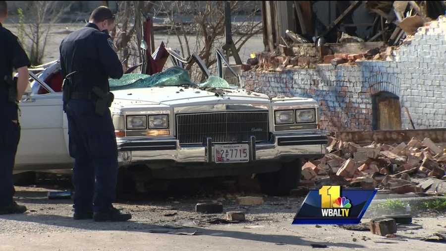 A cellphone video captures the frantic moments after a building collapsed on a car Monday in Baltimore City. The man who was inside that car, Thomas Lemmon, 69, died on Monday, city police said.