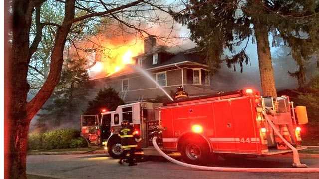 Firefighters battled a two-alarm fire Friday morning in Roland Park. City fire officials said the fire was reported around 6 a.m. in the 100 block of Longwood Road.
