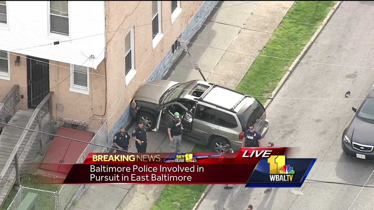 SUV crashes into house in Baltimore police chase