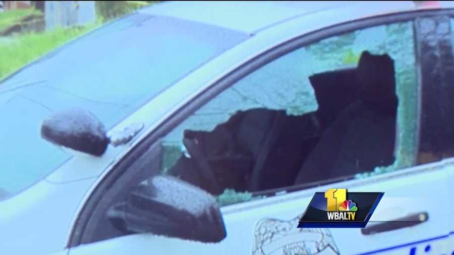 Authorities are investigating a shooting Sunday involving a Baltimore police officer as a "suicide by cop" situation. Police said a patrol officer in his 20s was writing reports in his marked car around 9:30 a.m. on Ulman Avenue between Reisterstown Road and Park Heights Avenue. Investigators said the officer noticed a man pointing a gun at him. They said the officer fired his weapon through the window of his patrol car and struck the gunman three times in the chest.