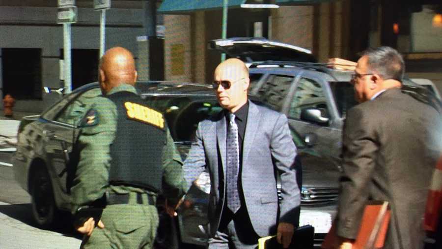 Lt. Brian Rice arrives at court prior to a pretrial motions hearing.