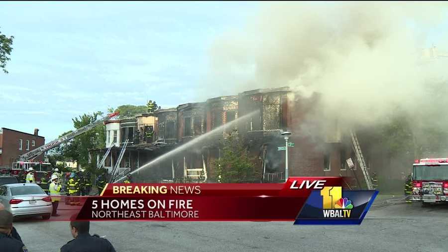 Crews are battling a two-alarm fire in northeast Baltimore early Monday.