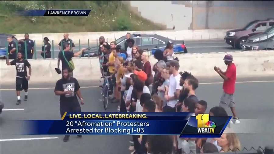 Several dozens of people were arrested Saturday after they blocked traffic along Interstate 83 in Baltimore, police said. The group started and Guilford and Chase before moving through Artscape and then down the Charles Street ramp to interstate, where they locked arms and blocked traffic along the northbound side of the highway, police said. Soon after, officers began making arrests and detained more than 20 protesters. The ramp to I-83 outside Artscape was already closed for the festival.
