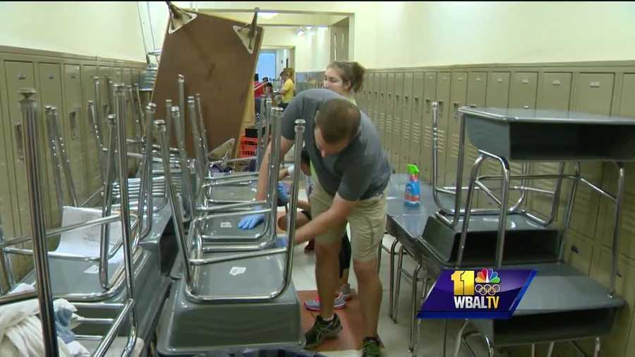 Volunteers are helping to restore a Baltimore school damaged by vandals as police continue to search for suspects. It has been two weeks since someone broke into Violetville Elementary-Middle School, causing more than $70,000 in damage. Since then, staff members have been frantically trying to put the school back in order. They got a big helping hand from the community Friday. On the first floor, the smell of household cleaning products filled the air, replacing an odor of water-soaked classrooms and hallways, left behind by vandals who tripped the sprinkler system, flooding every floor of the building.