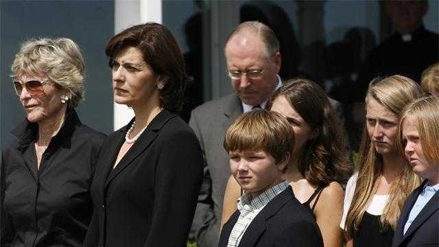 Victoria Kennedy, second left, Jean Kennedy Smith, left, and other family members watch as the casket of the late Sen. Edward Kennedy is moved to a hearse.