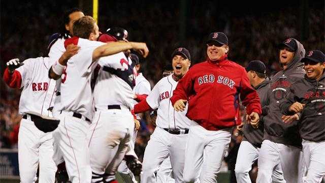 Boston Red Sox pitcher Curt Schilling poses for a picture with