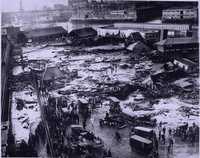 In one of Boston's more unusual disasters, 21 people were killed in a molasses flood in the city's North End in 1919. Take a look at how the neighborhood looked after the flood and how it looks today: 
