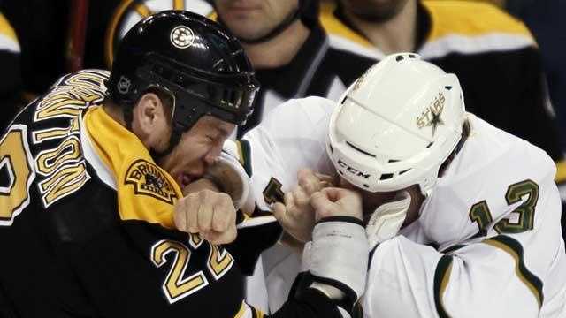 Boston Bruins' Shawn Thornton, left, and Dallas Stars' Krys Barch fight during the first period of an NHL hockey game in Boston on Thursday, Feb. 3, 2011.