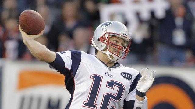 New England Patriots quarterback Tom Brady (12) throws against the Denver Broncos in the second quarter of an NFL football game, Sunday, Dec. 18, 2011, in Denver.




