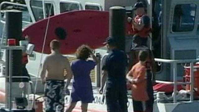 Woman, 8 kids rescued from raft off Cape