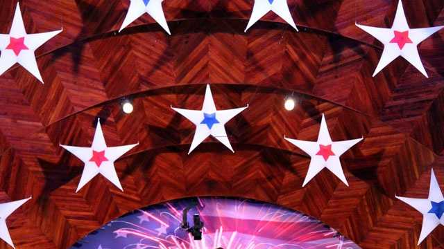 Boston Pops conductor Keith Lockhart amid a sea of stars on stage.