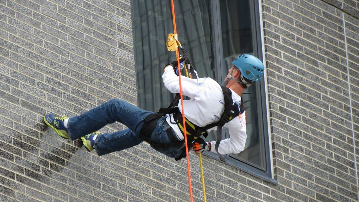 Images: Anthony and David rappel down Hub building