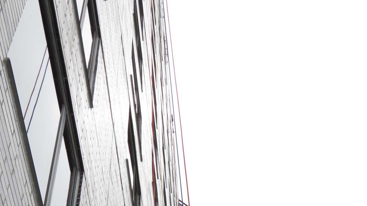 Images: Anthony and David rappel down Hub building