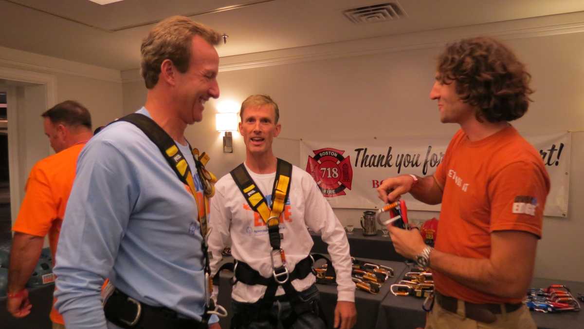 Images: Anthony and David rappel down Hub building