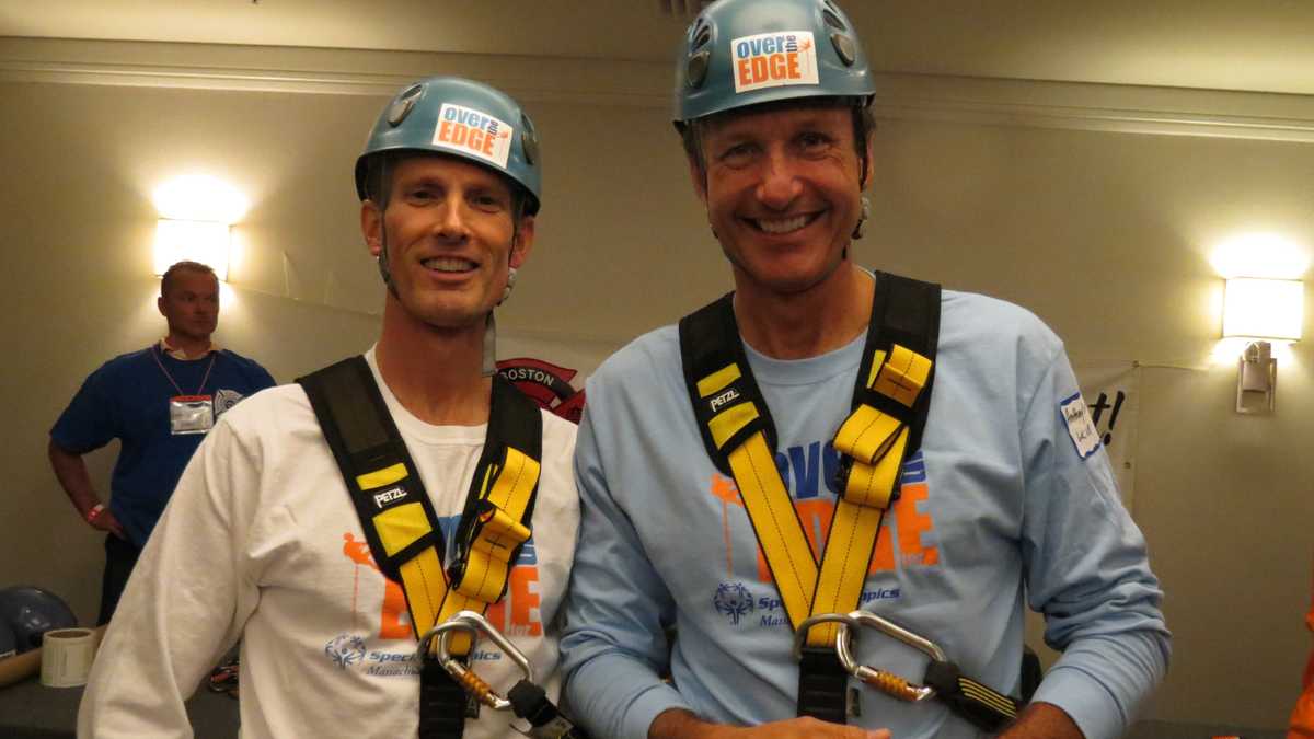 Images: Anthony and David rappel down Hub building