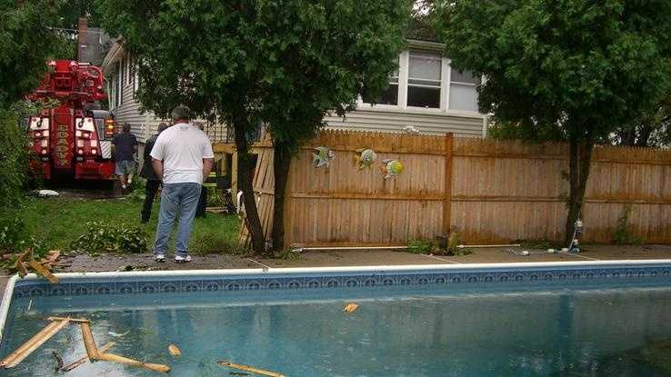 Photos: Vehicle crashes into backyard swimming pool
