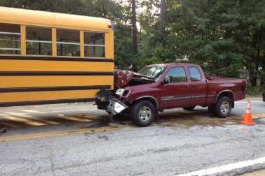 Charges Possible After Truck Hits School Bus