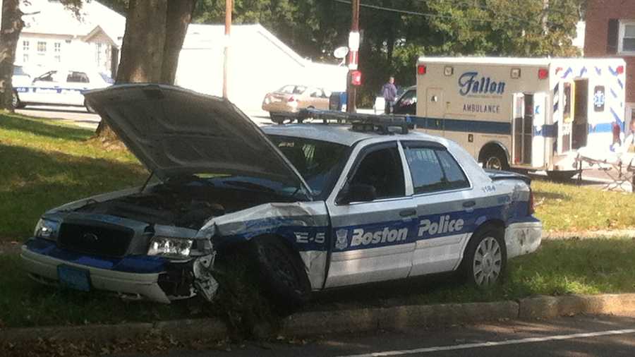 A Boston police officer was injured in a crash on the VFW Parkway on Monday morning.