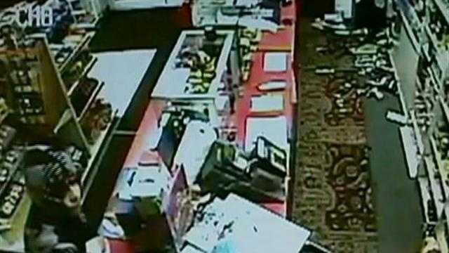 A store clerk in New Bedford trying to fend off two robbers -- one wielding a giant samurai sword!