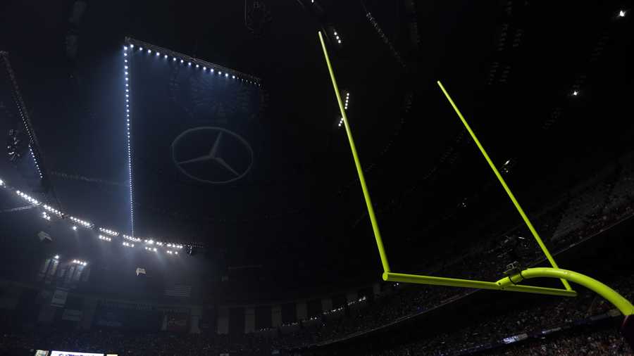 Half the lights are out in the Superdome during a power outage in the second half of the NFL Super Bowl XLVII football game.