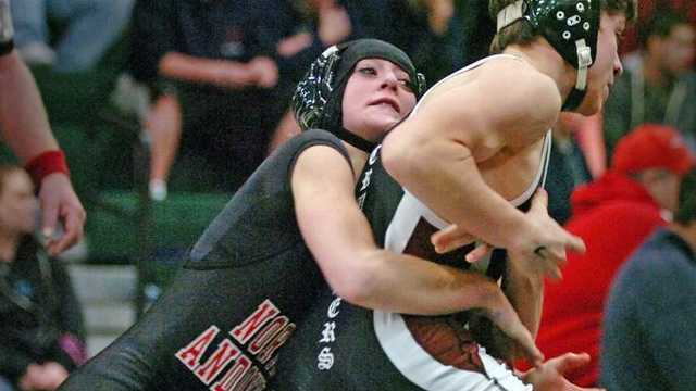 Carver's Aidan McGrath, right, wrestles North Andover's Danielle Coughlin for first place in the 106-pound category at the Marshfield wrestling tournament on Wednesday, Dec. 2.