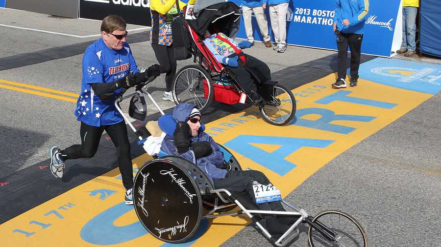 Dick Hoyt, left, and his son, Rick, start of the 117th running of the Boston Marathon, in Hopkinton.