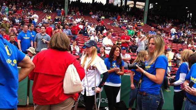 Heather Abbott, of Newport, R.I., makes a stop at Fenway Park after being discharged from Spaulding Rehabilitation Hospital on Saturday, May 11, 2013.