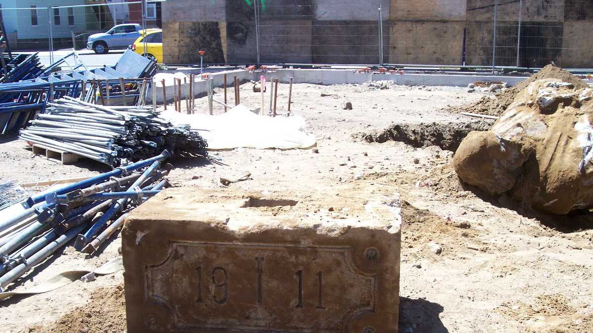 Workers find decades old statue buried underground