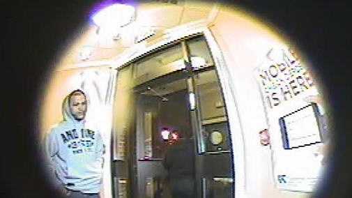 Police in Lowell are searching for a man officials say robbed five customers at an ATM.