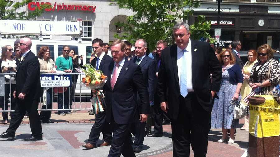 The Prime Minister of Ireland, Enda Kenny, visited the Boston Marathon memorial site in Copley Square with Boston Police Commissioner Ed Davis Sunday.