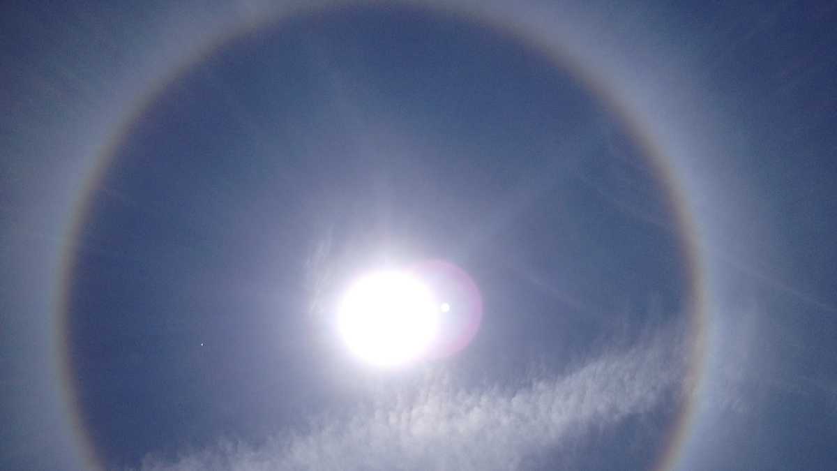 Rainbow around sun draws attention in Mass.
