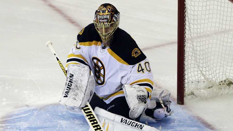 Boston Bruins goalie Tuukka Rask stops a shot on the goal against the New York Rangers