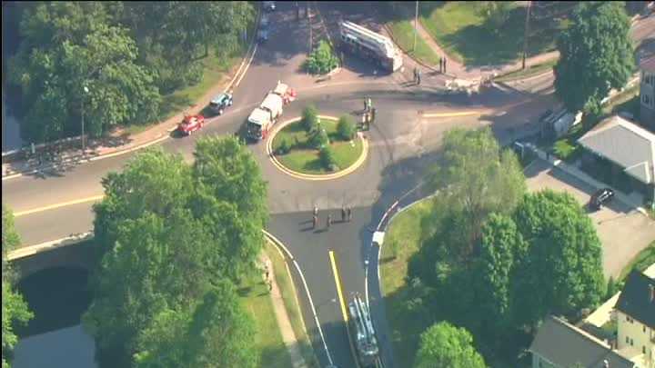 Photos: Tanker crashes, leaks fuel in neighborhood