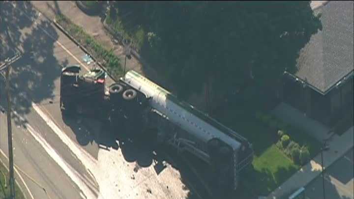 Roadway reopens after tanker truck crashes, leaks fuel in neighborhood