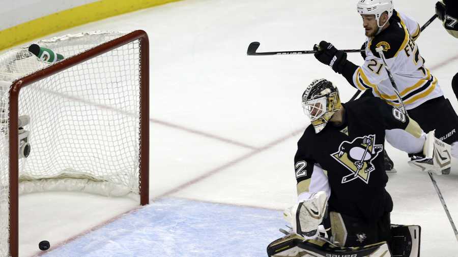 Pittsburgh Penguins goalie Tomas Vokoun watches as a shot by Boston Bruins' David Krejci gets past him for a goal in the first period of Game 1 in an NHL hockey Stanley Cup Eastern Conference finals, Saturday, June 1, 2013, in Pittsburgh. 
